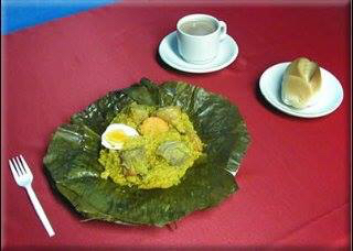 We call it Tamal. It is a typical Colombian breakfast dish. It consists of a corn-based dough steamed in a platain leaf wrapper.it is usually filled with chicken or meat , peas, diced carrots ,a boiled egg, and rice. It is served with a piece of bread or arepa, and a hot drink like chocolate or coffee. I prefer to have it with chocolate and a piece of bread, all these together make my perfect breakfast! Colombia